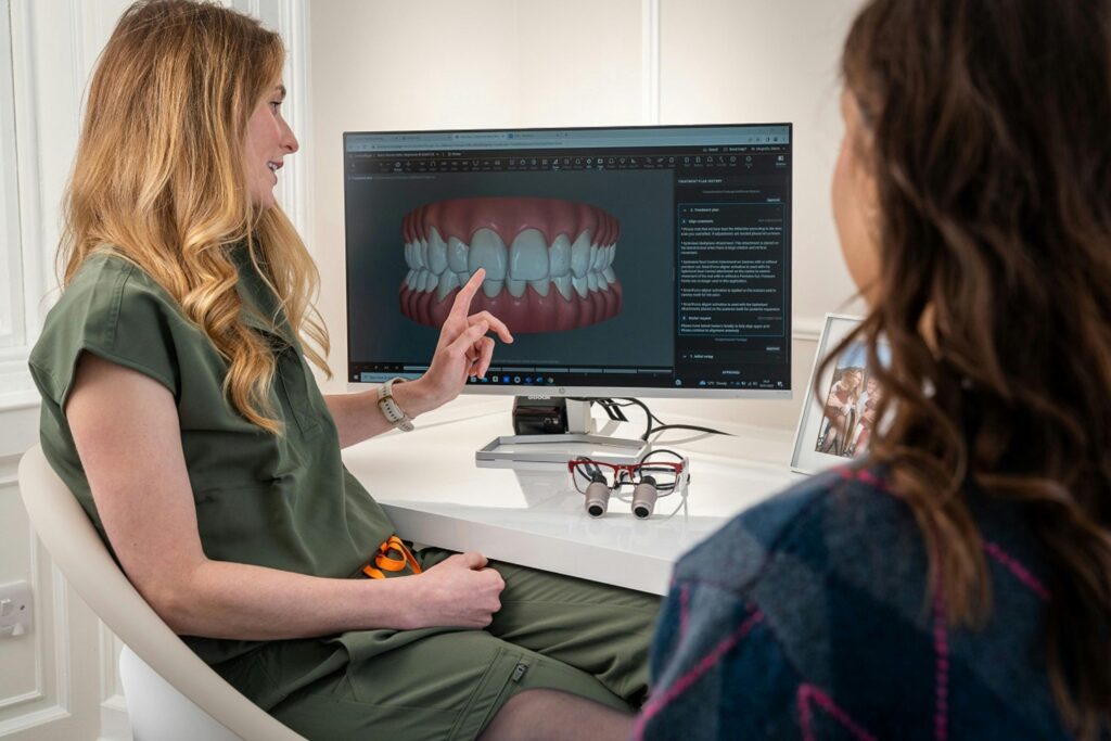 Dr. Katz explaining the same day dental implants procedure to a patient at Manhattan Arch Implant Center